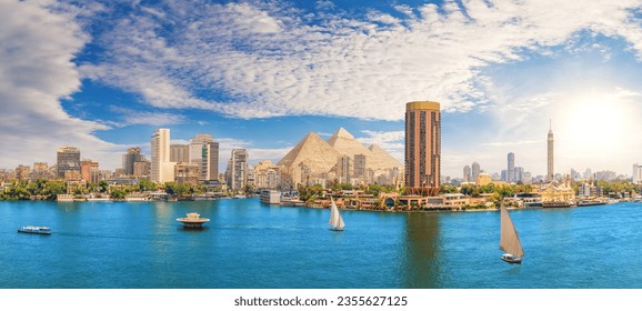 View on the Nile, Cairo city and famous Pyramids in the beautiful panorama of Egypt