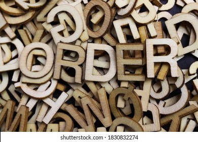 View On Pile Chaotic Scattered Alphabet Letters Forming Word Order (focus On Letter E Right)