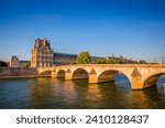 View on Pont Royal and Louvre Museum from Seine river in Paris, France