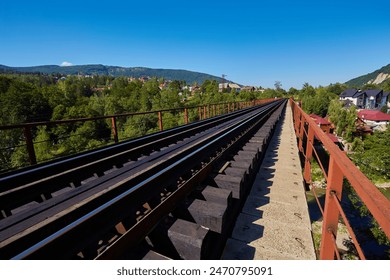 View on railway bridge above the Prut river. Beauteful autumn in Carpathian mountains, Yaremche, Ukraine - Powered by Shutterstock