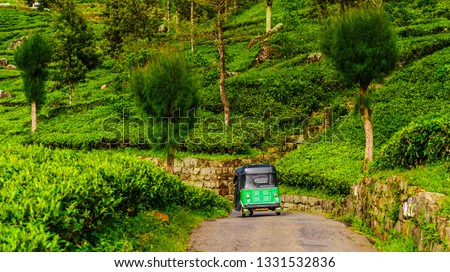 View on red Tuk Tuk on the way to tea plantation in Haputale, Sri Lanka