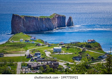 View on the Percé rock, the ocean, the cape Mont Joli, and the Percé Village from the Unesco Geopark and their Belvedere hiking trail