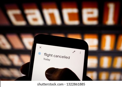 View On Smartphone Screen At Airport. Typing Finger. Flight Cancelled Pop Up On Calendar. Schedule App, Cancel Flight, Booking And Insurance Concept. Travel And Holidays Due Corona Virus Cancellation