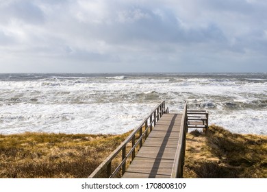 View On Stormy Ocean From A Wooden Pier