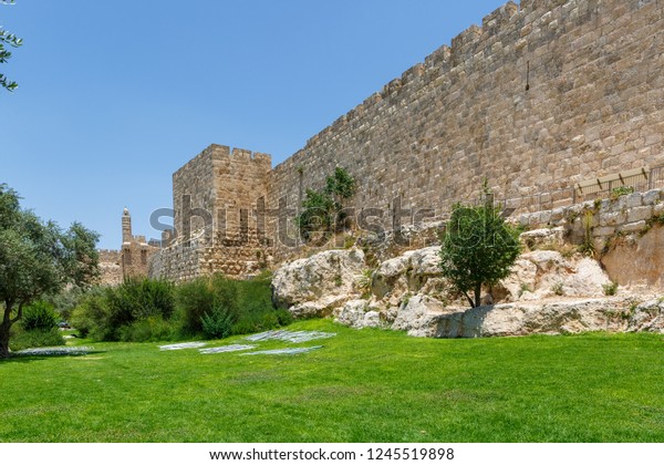 View on Walls of the old city of Jerusalem and King\
David tower at far