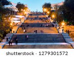 View of one of the landmarks of Odessa: the Potemkin Stairs in the evening with beautiful lighting of the park and the staircase itself.