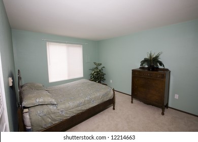 View Of An Ordinary Bedroom In A Condominium