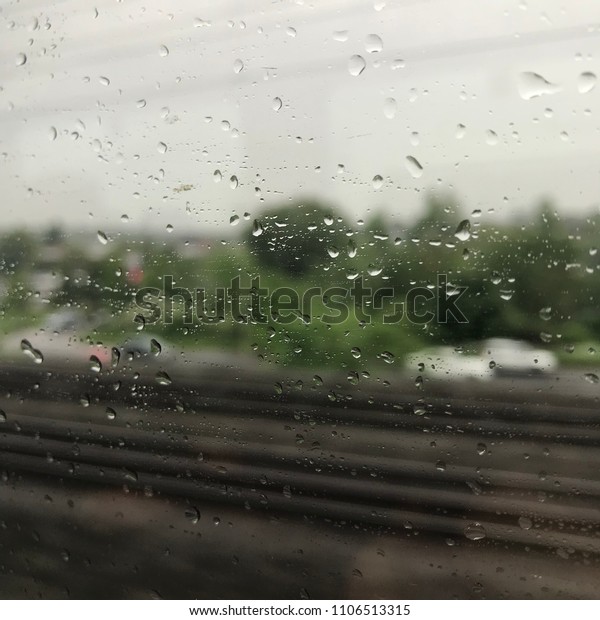 View out of train\
window during rain, London