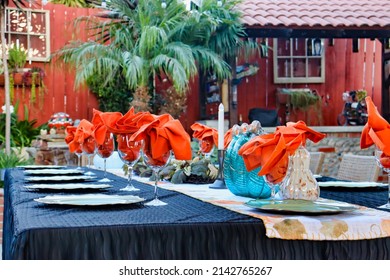 View Of An Outdoor Thanksgiving Dinner Table Setting.