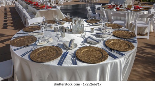 View Of An Outdoor Wedding Reception With Dance Floor. Party Rentals Concept.