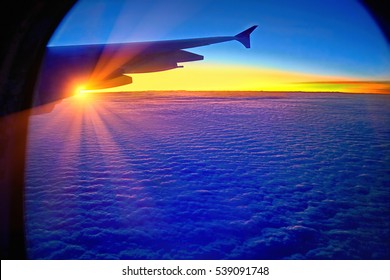  View Outside The Plane Window.Beautiful Sunset.Beautiful Sunrise.