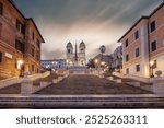 View over a beautiful historic Roman city. At one of the sights, with old buildings in an urban flair. Morning sunrise at the Spanish Steps
Scalinata di Trinità dei Monti, Rome, Italy