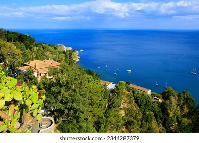 View over the beautiful Mediterranean coastline from above at Taormina, Sicily, Italy