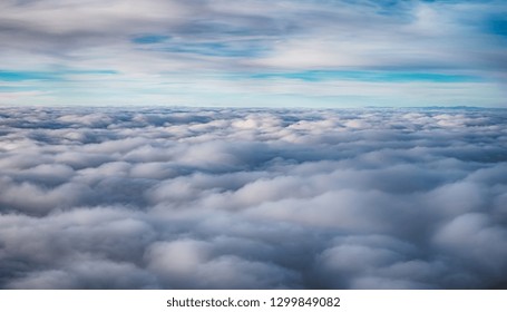 View over the clouds from airplane