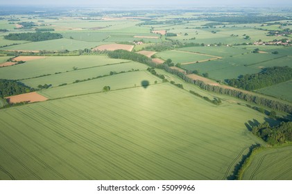 View Over The Early Summer Green Fields From Hot Air Balloon; East Anglia; UK