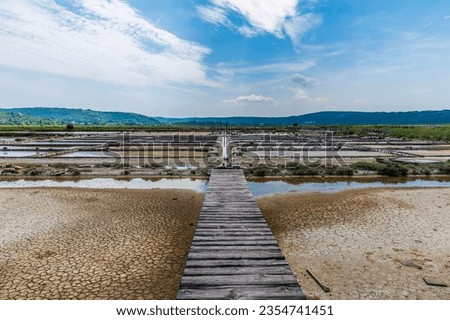 A view over empty crystallisation pools at the salt pans at Secovlje, near to Piran, Slovenia in summertime