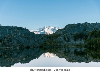 View over Lago Grey (Grey Lake) with reflection of snow covered mountains of the Paine Massif in water along W-trek hiking route in Torres del Paine National Park, Patagonia, Chile - Powered by Shutterstock