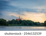 View over Lake Bordesholmer See to old monastary church, Klosterkirche, Bordesholm, Schleswig-Holstein