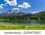 View over the Lautersee lake to the Karwendel mountains near Mittenwald, Germany.