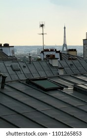 View over Paris rooftops with the Eiffel tower in the background