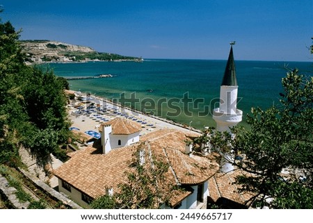 View over the Quiet Nest villa and minaret, Palace of Queen Marie, Balchik, Black Sea coast, Bulgaria, Europe
