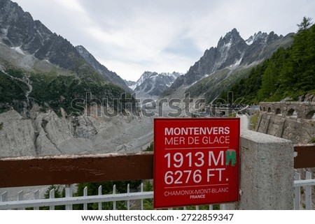 View over the retreating Mer de Glace glacier from the Montenvers rack railway viewpoint above Chamonix in the Mont Blanc massif.