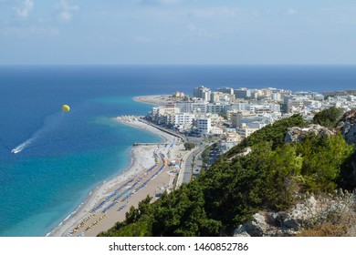 View Over Rhodes Town, Beach And Parasailing  From The Temple Of Athena Polias And Zeus Polieus, Rhodes, Greece