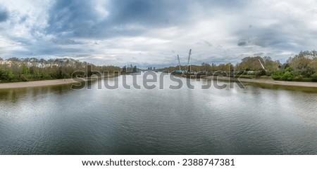 View over the river Thames from Chelsea Bridge, London, England, UK
