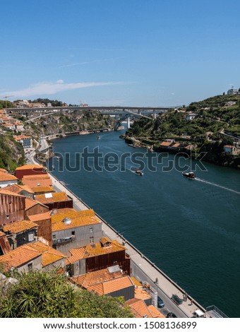 View over the roofs down to the Douro River from the train tracks on Ponte Luis in Oporto