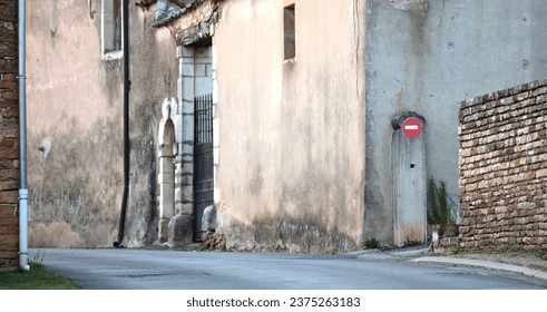 View over a small road through a French village, no entry sign