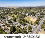 A view over a suburban neighborhood with a large park in Fairfield, California