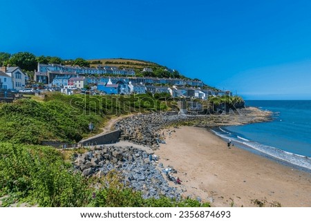 A view over the west beach in the town of New Quay, Wales in summertime