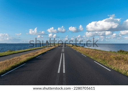 View over the Zeedijk, access road to the island of Marken. Province of North Holland in the Netherlands