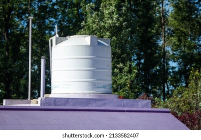 View of overhead water tank for storing the water needs for the house.