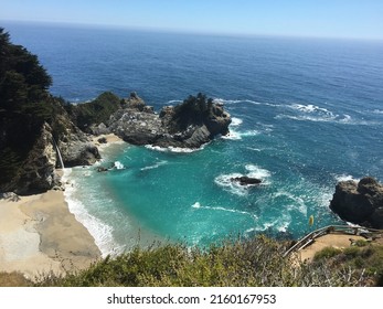 A view of the Pacific Ocean and McWay Falls from the viewpoint in Big Sur, California. - Powered by Shutterstock