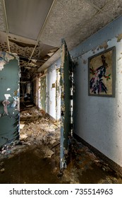 A View Of A Painting In A Hallway Inside The Abandoned Hudson River State Hospital In New York.