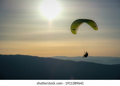 View of a paraglider from the Col de la Forclaz in Annecy