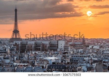 Similar – View of Paris with Eiffel tower silhouette at sunset