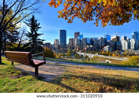 View from a park overlooking the skyline of Calgary, Alberta during autumn