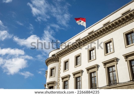 view to parliament of Hesse in Wiesbaden, a former castle, with Hesse Flag at roof top under blue sky Stock photo © 