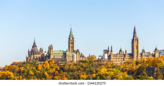 A view of Parliament Hill in Ottawa, Canada from the West shows the famous landmarks at this historic site, including the library and Peace Tower of Centre Block and Mackenzie Tower of West Block.