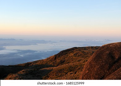 View Of Pedra Do Açú (2,245m) In The Serra Dos Órgãos National Park, At The Most Point Of The City Of Petrópolis.