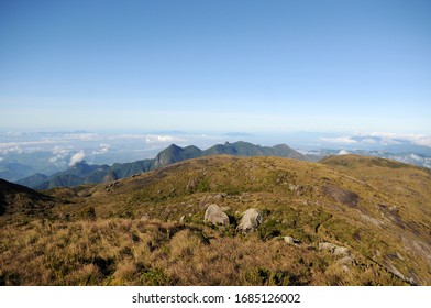 View Of Pedra Do Açú (2,245m) In The Serra Dos Órgãos National Park, At The Most Point Of The City Of Petrópolis.