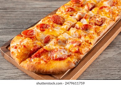A view of a pepperoni flatbread.