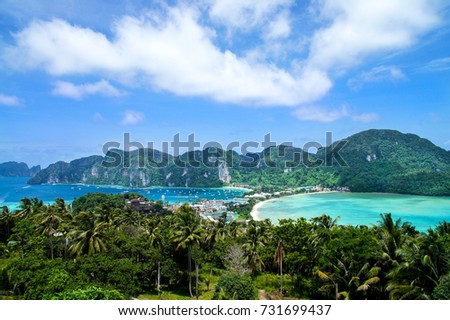 View of Phi Phi Don Island with cloudy blue sky and coconut trees from Phiphi Viewpoint 2, Krabi, Thailand