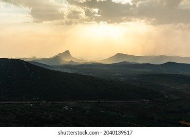 View of Pic Saint-Loup and the Hortus mountain from the Puech des Mourgues in Saint-Bauzille-de-Montmel during sunset (Occitanie, France)
