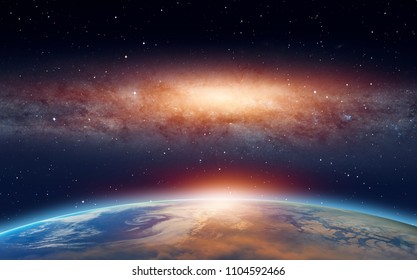 View Of The Planet Earth From Space During A Sunrise Against Milkyway Galaxy 