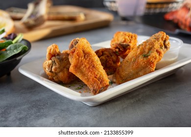 A View Of A Plate Of Cajun Spice Chicken Wings.