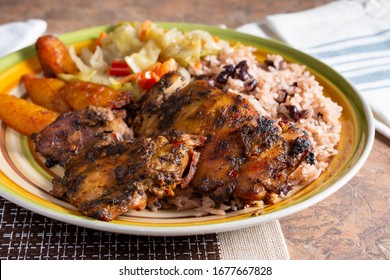 A view of a plate of jerk chicken. - Shutterstock ID 1677667828