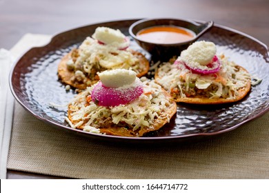 A View Of A Plate Of Three Salvadoran Enchiladas.